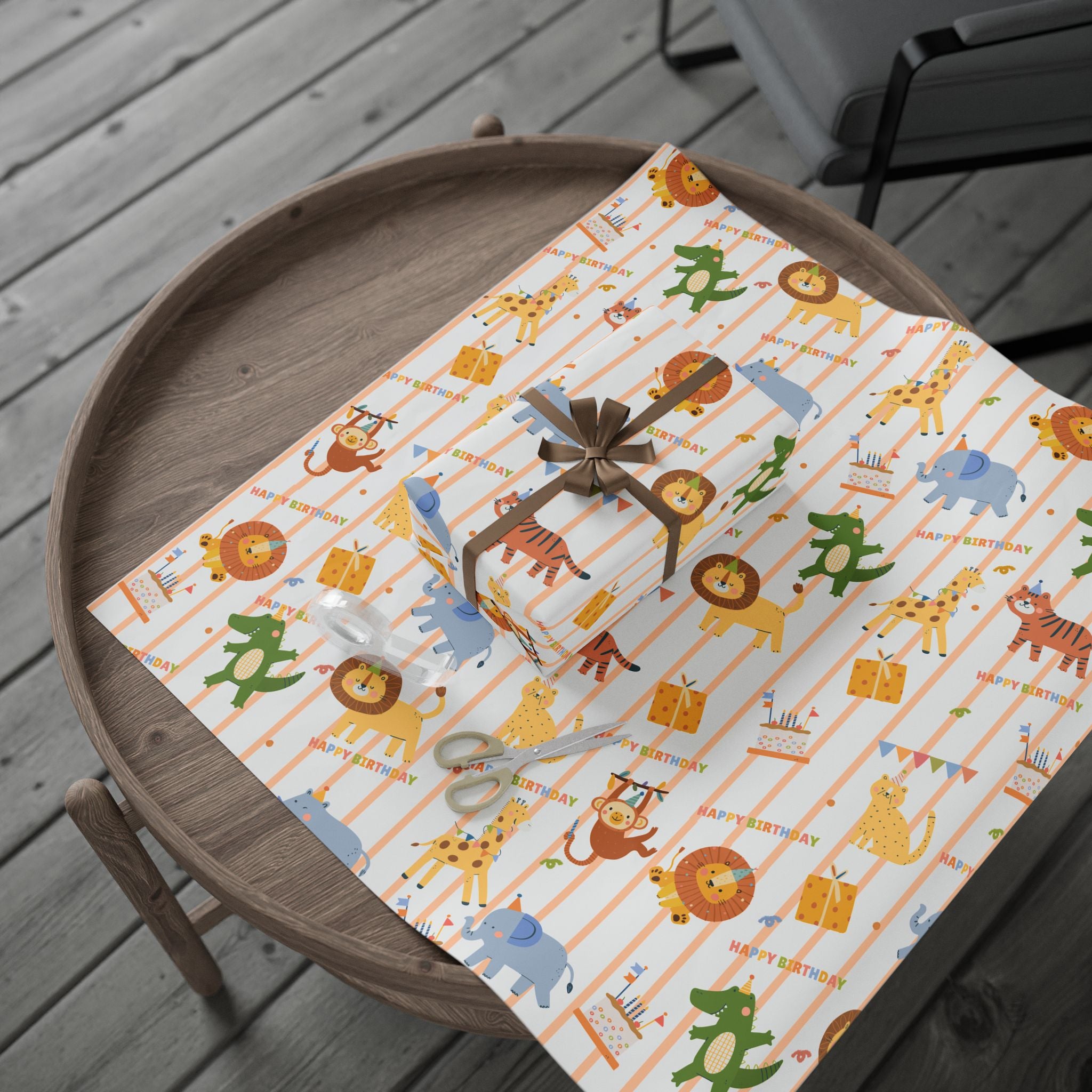 Gift wrapped in a patterned paper with cartoon animals on a wooden tray.
