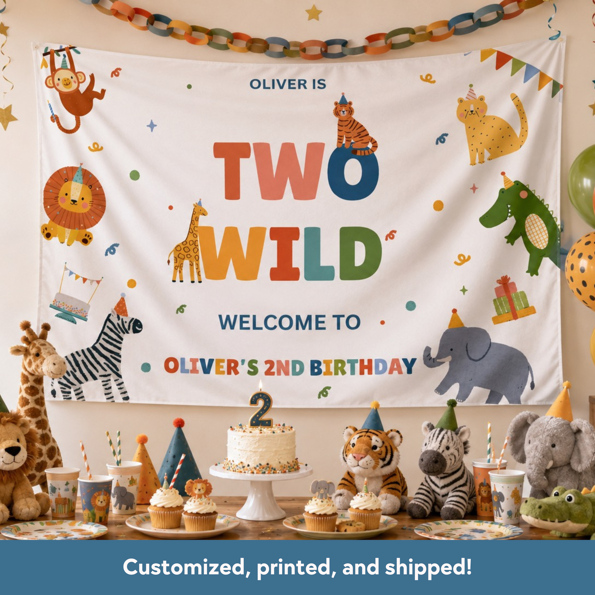 Birthday party setup with a colorful banner, cake, and animal-themed decorations.