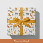 Gift box with animal pattern and yellow ribbon on a white background