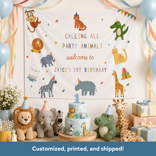 Children's birthday party setup with animal-themed decorations, cake, and balloons.