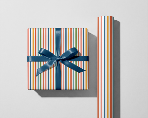 Gift box with striped pattern and blue ribbon on a light gray background