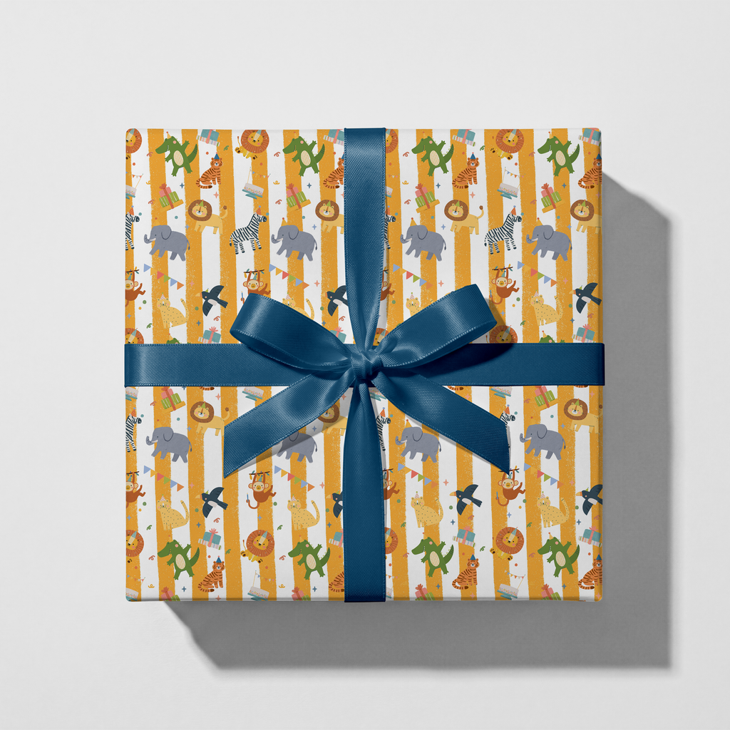 Gift box with animal pattern and blue ribbon on a white background